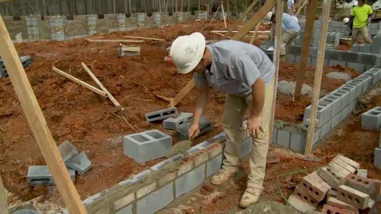 Brickmason building a wall